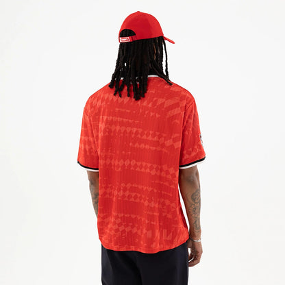 The model is wearing this NFL Kansas City Chiefs Soccer Jersey in red. 2
