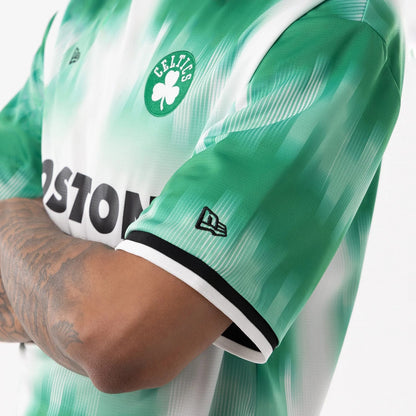 The model is wearing this NBA Boston Celtics Soccer Jersey in green. 5