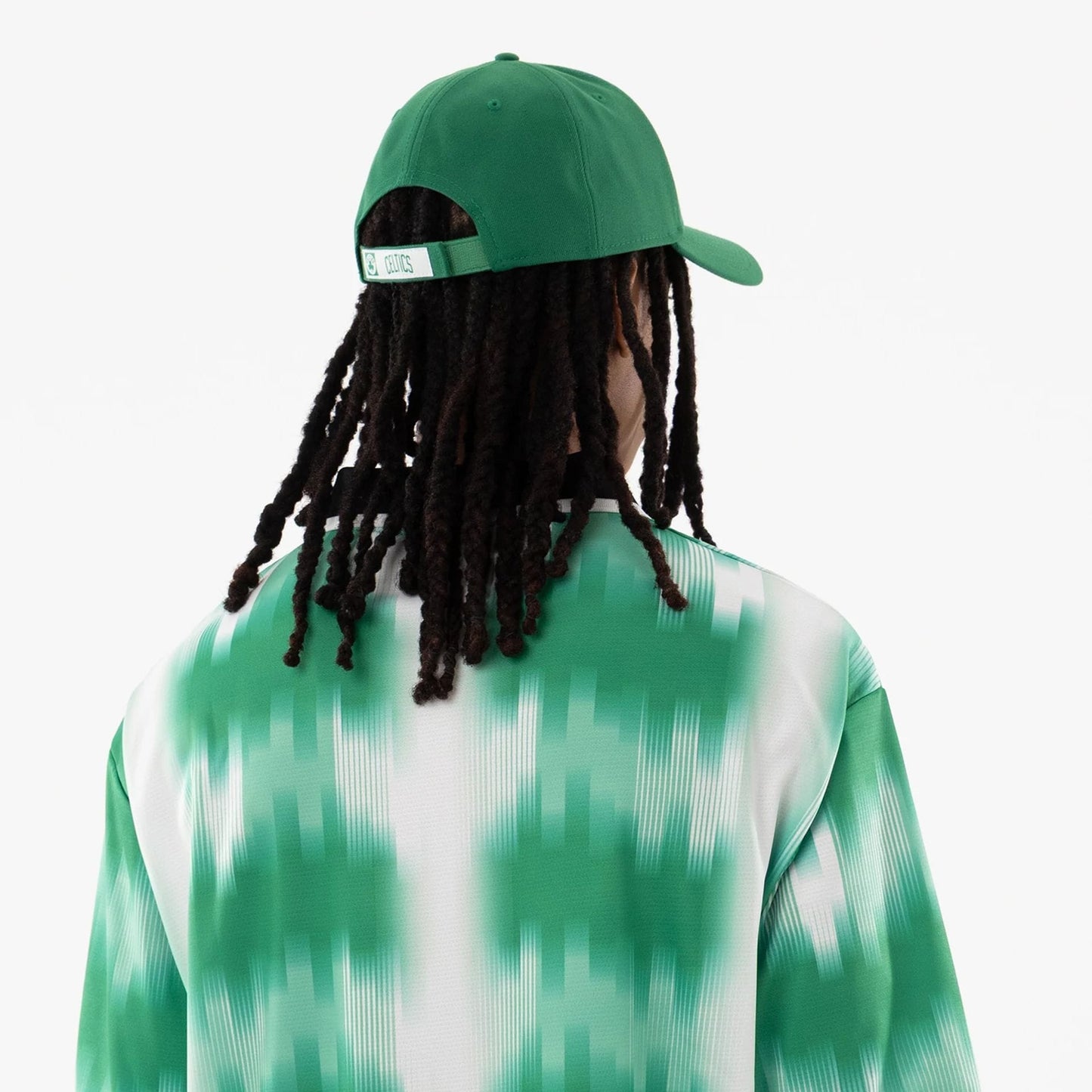 The model is wearing this NBA Boston Celtics Soccer Jersey in green. 7