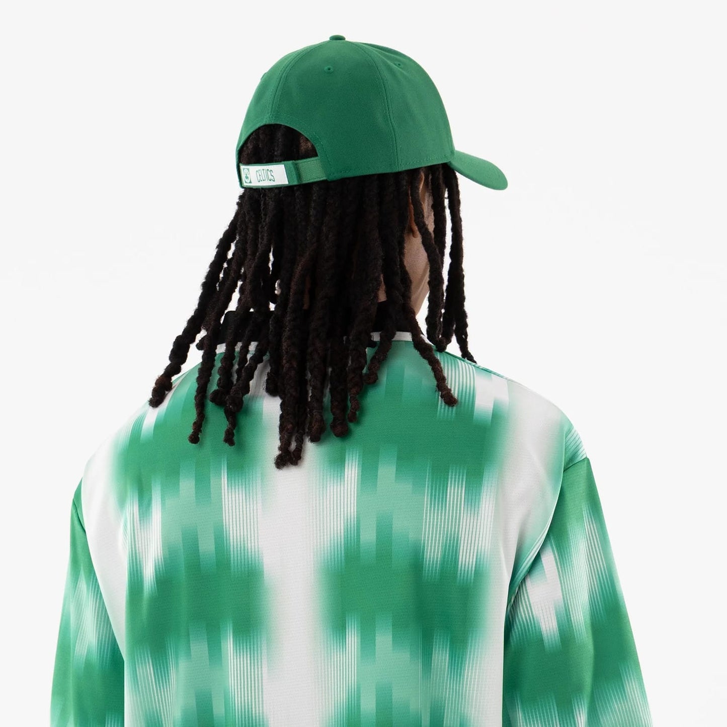 The model is wearing this NBA Boston Celtics Soccer Jersey in green. 7