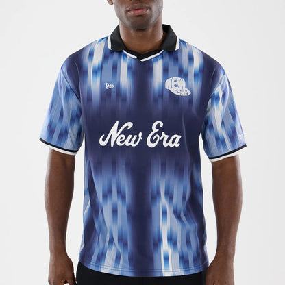 The model is wearing this New Era Soccer Jersey in navy. 3
