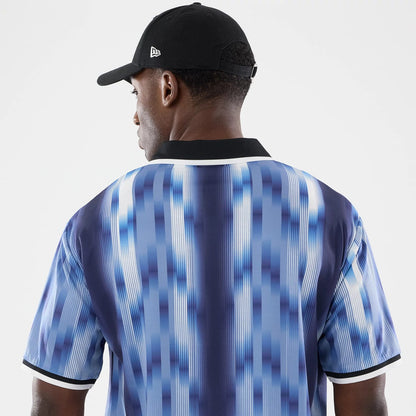 The model is wearing this New Era Soccer Jersey in navy. 6