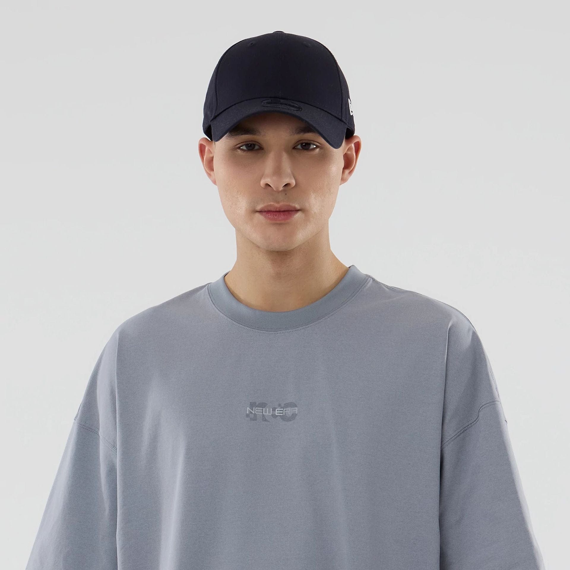 The model is wearing this New Era Urban Core Oversized T-Shirt in grey. 6