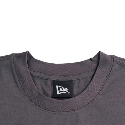 The model is wearing this New Era NEC Logo Oversized T-Shirt in black. 3