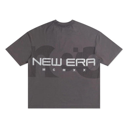 The model is wearing this New Era NEC Logo Oversized T-Shirt in black. 6