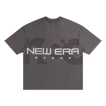 The model is wearing this New Era NEC Logo Oversized T-Shirt in black. 6