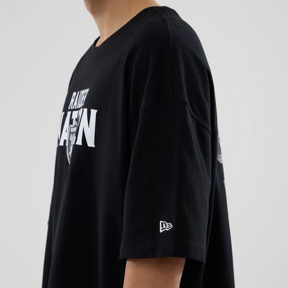 The model is wearing this NFL Rivalry Las Vegas Raiders Oversized T-Shirt in black. 6