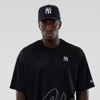 The model is wearing this MLB Mix League New York Yankees Oversized Mesh T-Shirt in black. 7