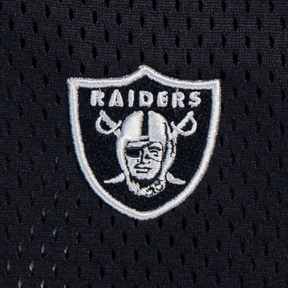 The model is wearing this NFL Mix League Las Vegas Raiders Oversized Mesh T-Shirt in black. 4