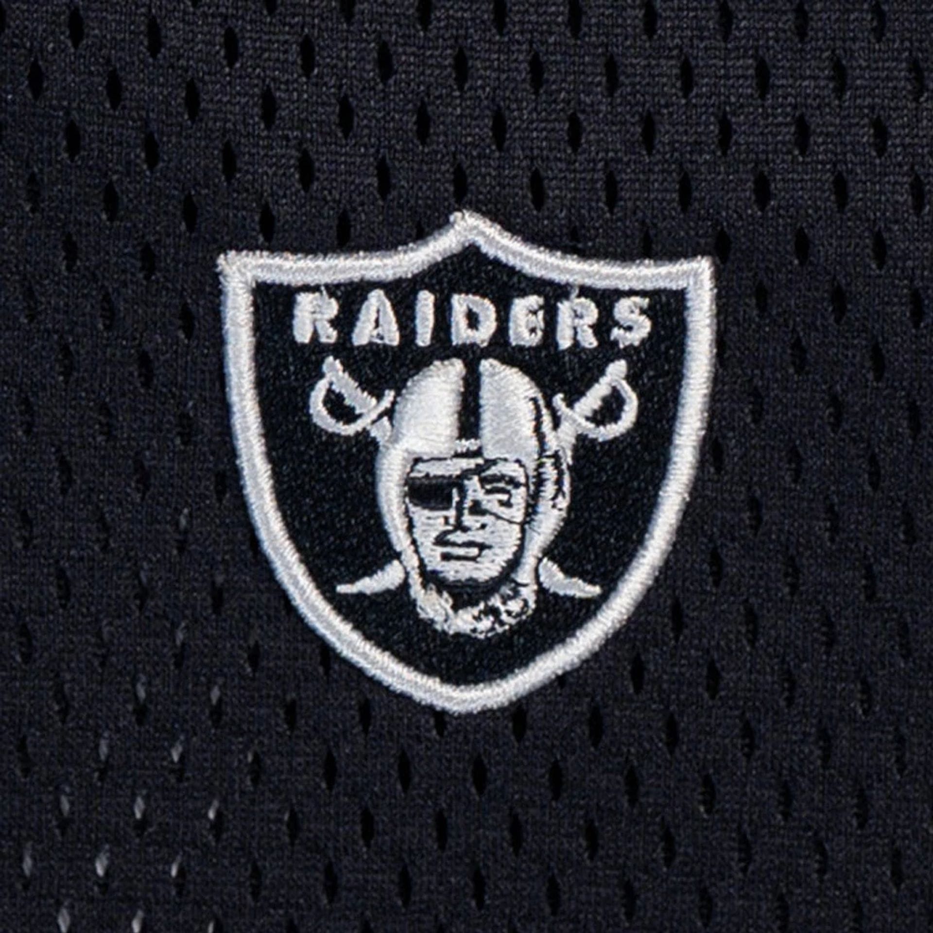 The model is wearing this NFL Mix League Las Vegas Raiders Oversized Mesh T-Shirt in black. 4