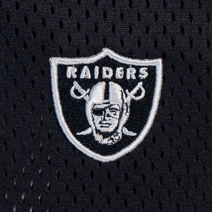 The model is wearing this NFL Mix League Las Vegas Raiders Oversized Mesh T-Shirt in black. 4