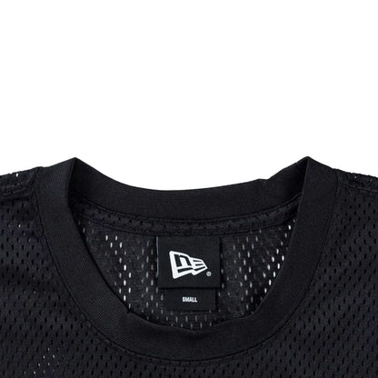 The model is wearing this NFL Mix League Las Vegas Raiders Oversized Mesh T-Shirt in black. 3