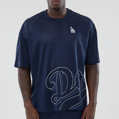 The model is wearing this MLB Mix League LA Dodgers Oversized Mesh T-Shirt in blue. 3