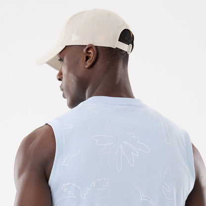 The model is wearing this New Era Resort Tank Top in blue. 7