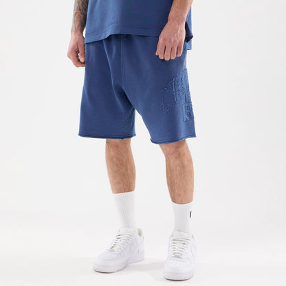The model is wearing this New Era Street Archived Oversized Shorts in blue. 1