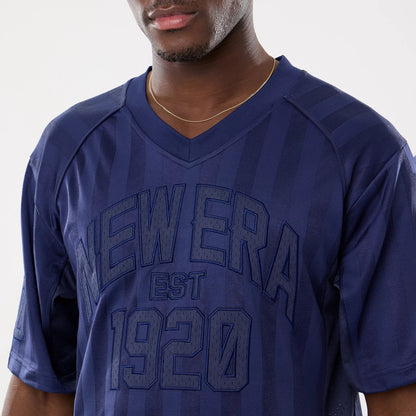 The model is wearing this New Era Street Archived Mesh Jersey in navy. 4