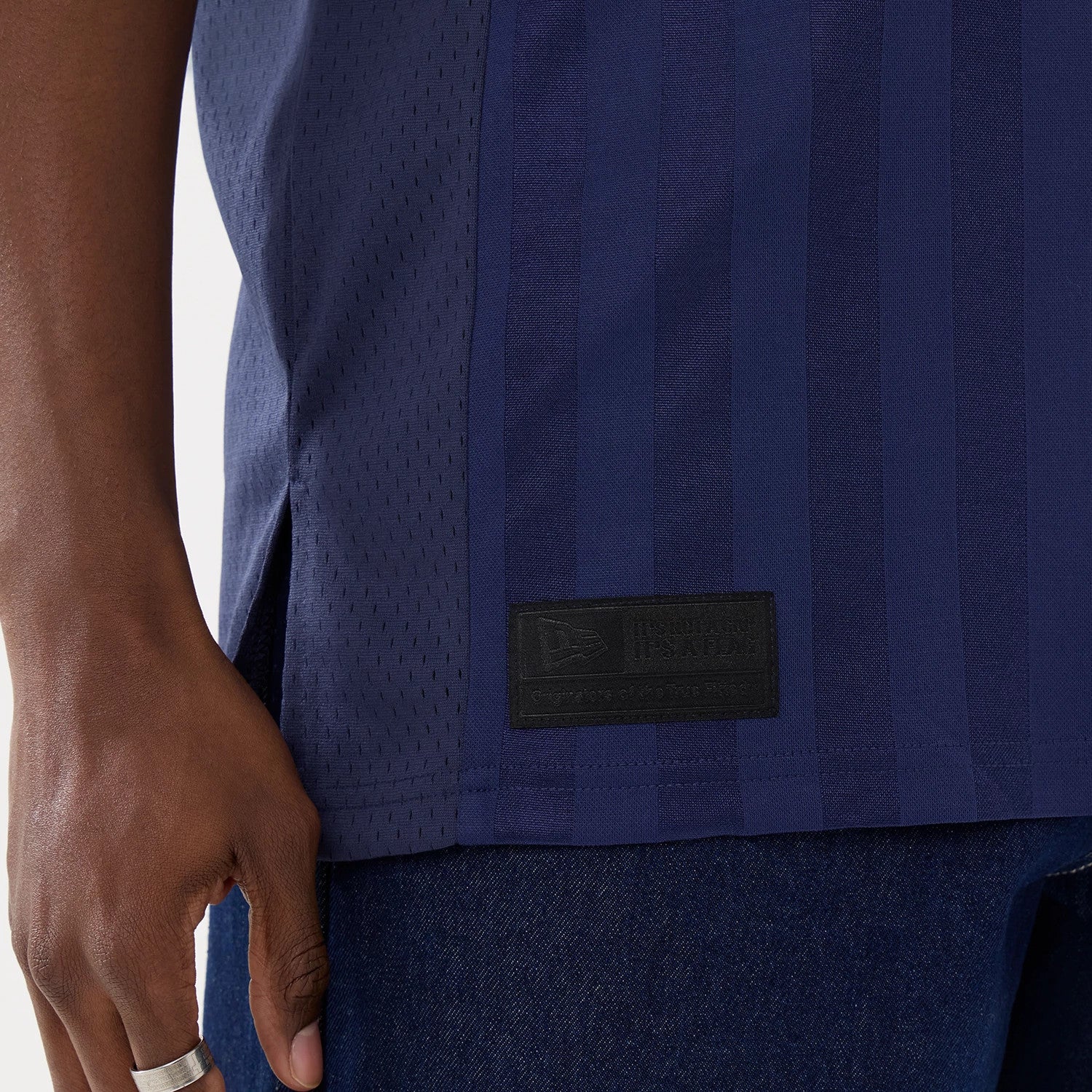 The model is wearing this New Era Street Archived Mesh Jersey in navy. 6