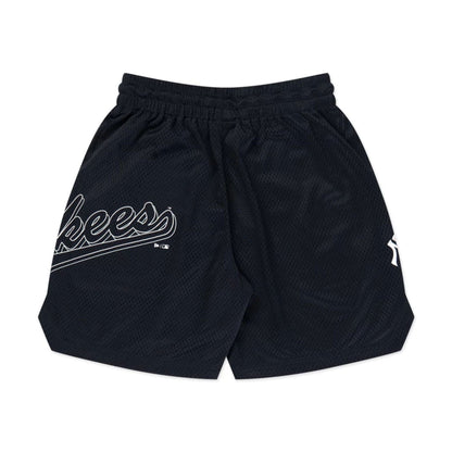 The model is wearing this MLB Mix League New York Yankees Oversized Mesh Shorts in black. 8