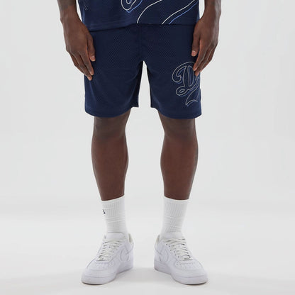 The model is wearing this MLB Mix League LA Dodgers Oversized Mesh Shorts in blue. 1