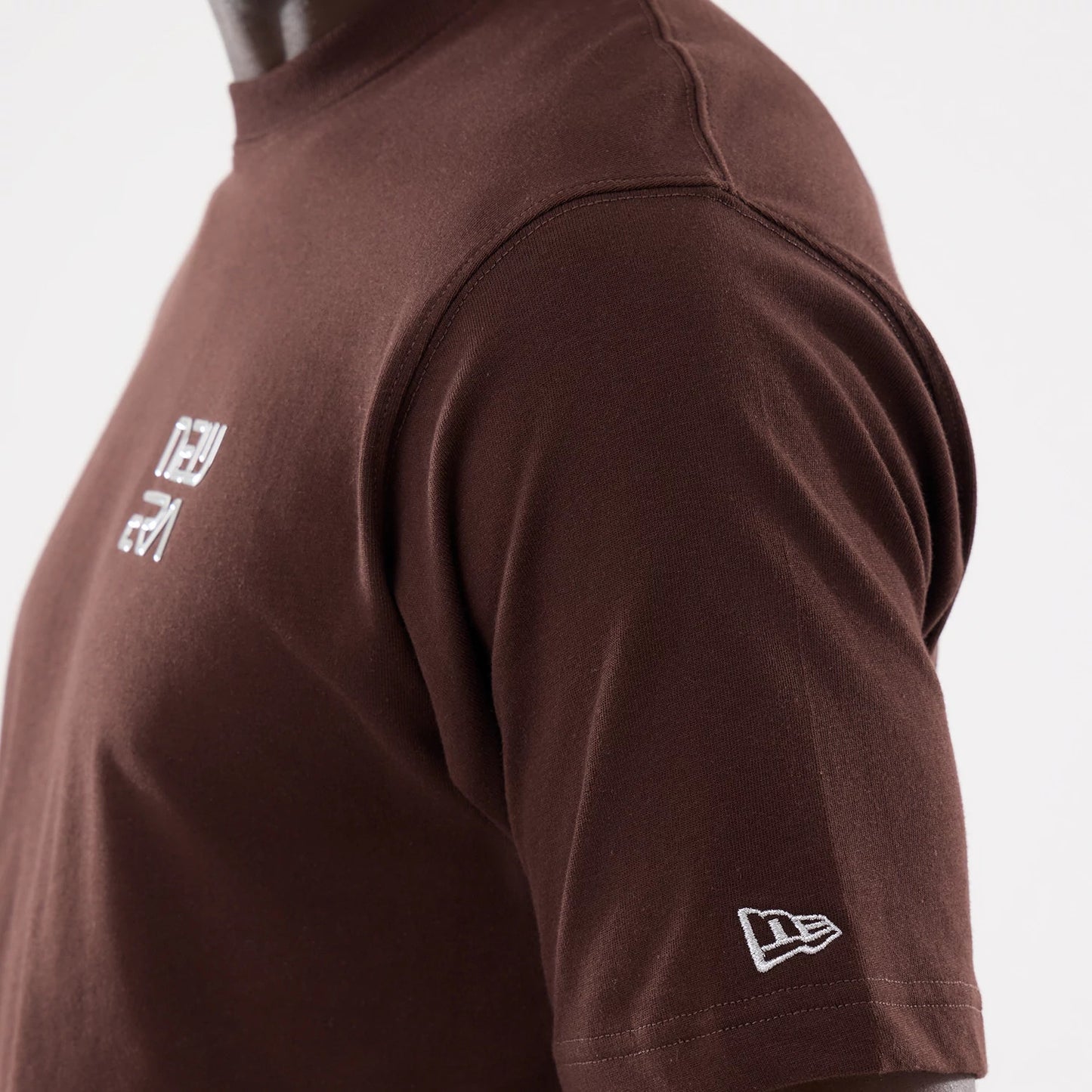 The model is wearing this Hajime Sorayama X MLB San Diego Padres T-Shirt in Dark Brown. 5