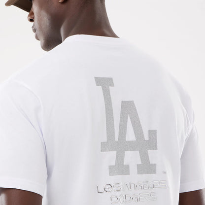 The model is wearing this Hajime Sorayama X MLB LA Dodgers T-Shirt in white. 5