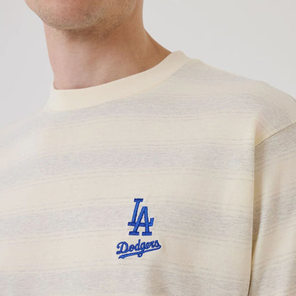 The model is wearing this MLB Border LA Dodgers Oversized T-Shirt in cream. 4