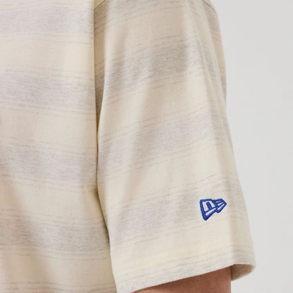 The model is wearing this MLB Border LA Dodgers Oversized T-Shirt in cream. 5