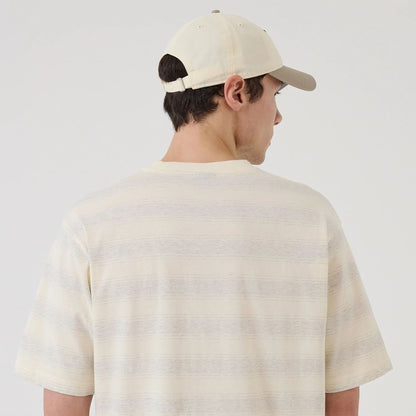 The model is wearing this MLB Border LA Dodgers Oversized T-Shirt in cream. 7