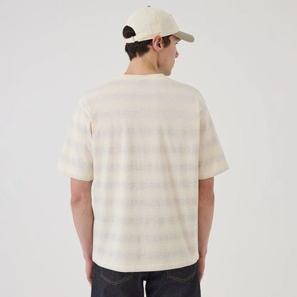 The model is wearing this MLB Border LA Dodgers Oversized T-Shirt in cream. 2
