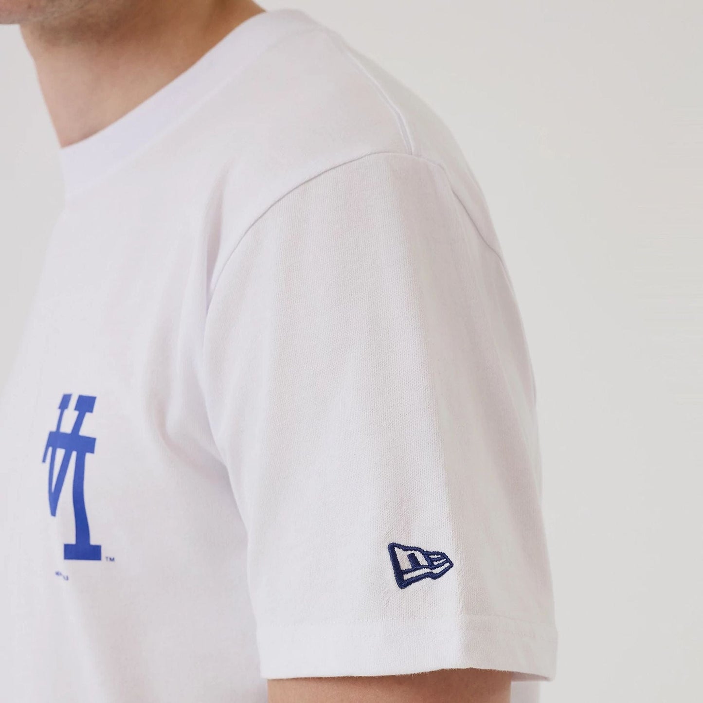 The model is wearing this MLB Upside Down LA Dodgers T-Shirt in white. 6