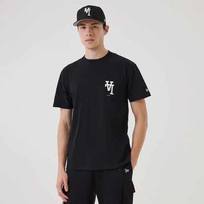 The model is wearing this MLB Upside Down LA Dodgers T-Shirt in black. 1