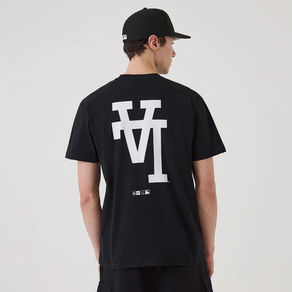 The model is wearing this MLB Upside Down LA Dodgers T-Shirt in black. 2