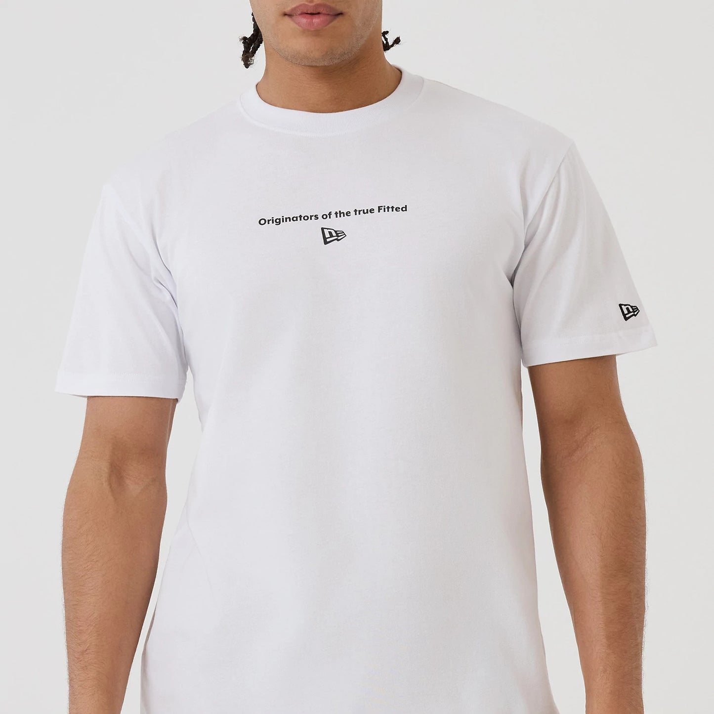 The model is wearing this New Era Circle T-Shirt in white. 6
