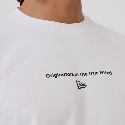 The model is wearing this New Era Circle T-Shirt in white. 3