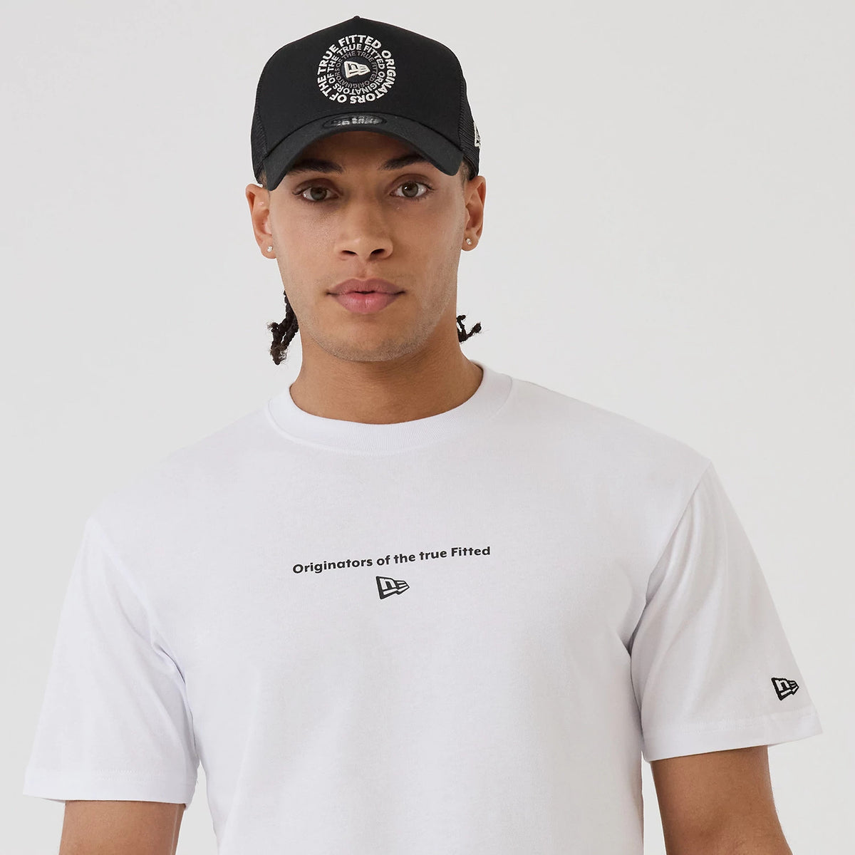 The model is wearing this New Era Circle T-Shirt in white. 5