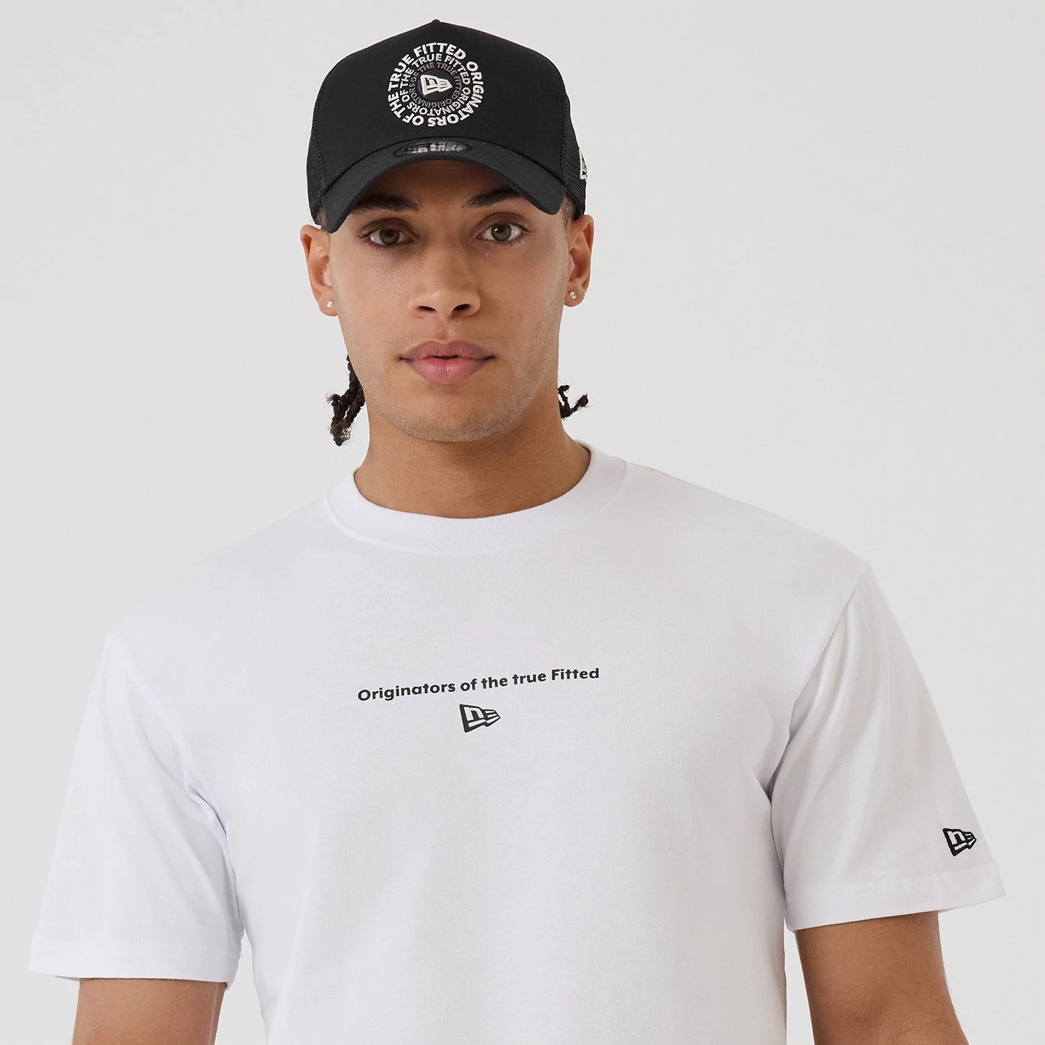 The model is wearing this New Era Circle T-Shirt in white. 5
