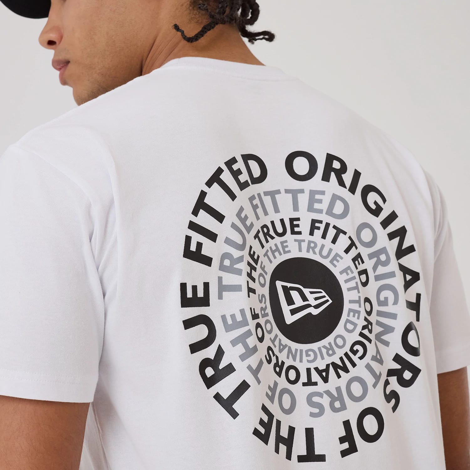 The model is wearing this New Era Circle T-Shirt in white. 4