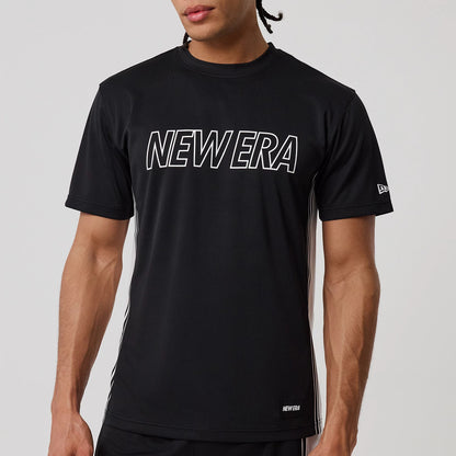 The model is wearing this New Era Mesh T-Shirt in black. 5