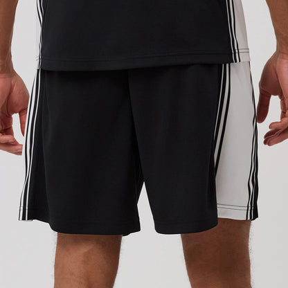 The model is wearing this New Era Mesh Shorts in black. 5