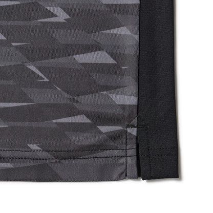 The model is wearing this New Era Grid Polo T-Shirt in black. 8