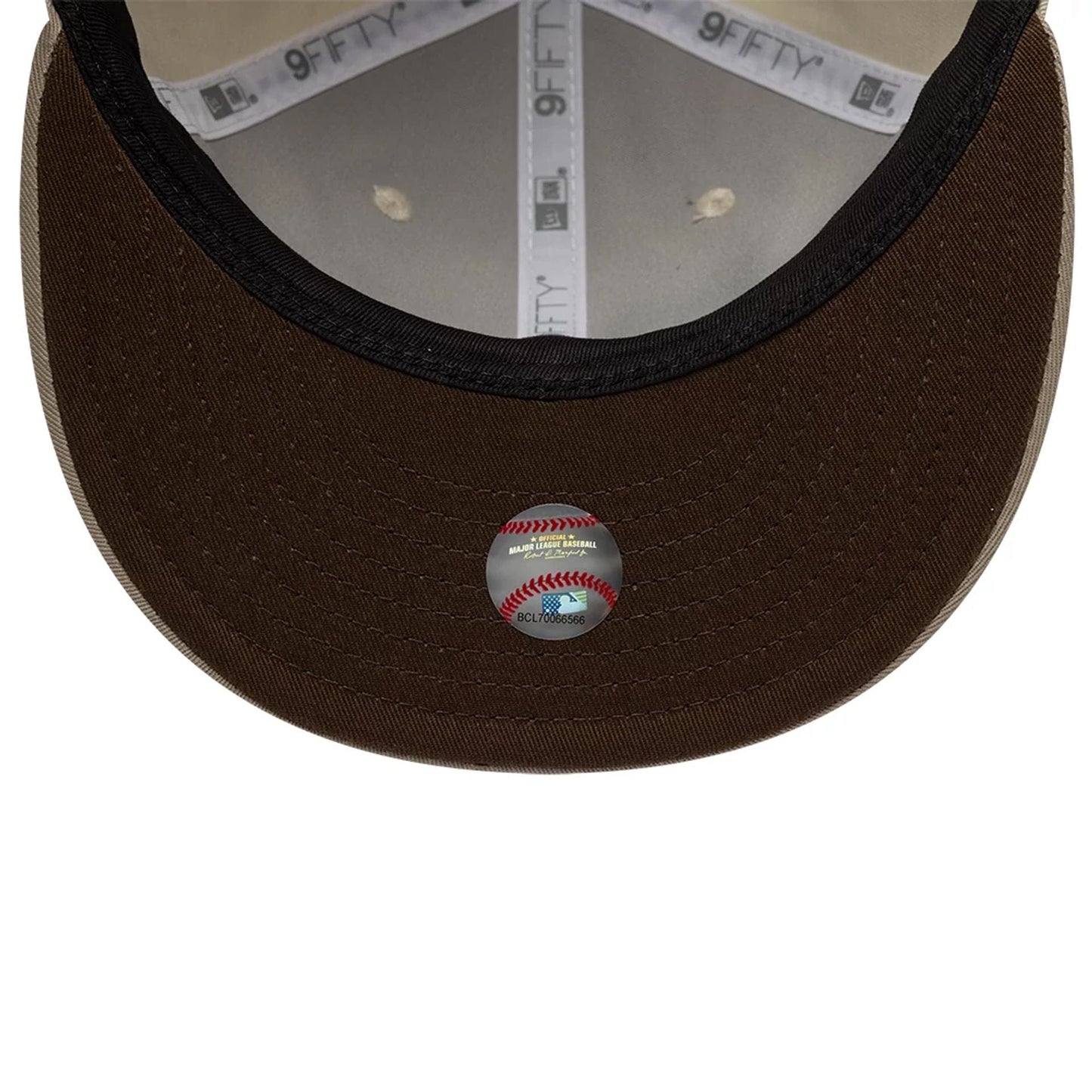 Pictured is this Hajime Sorayama X MLB San Diego Padres Retro Crown 9FIFTY cap in Cream. 2