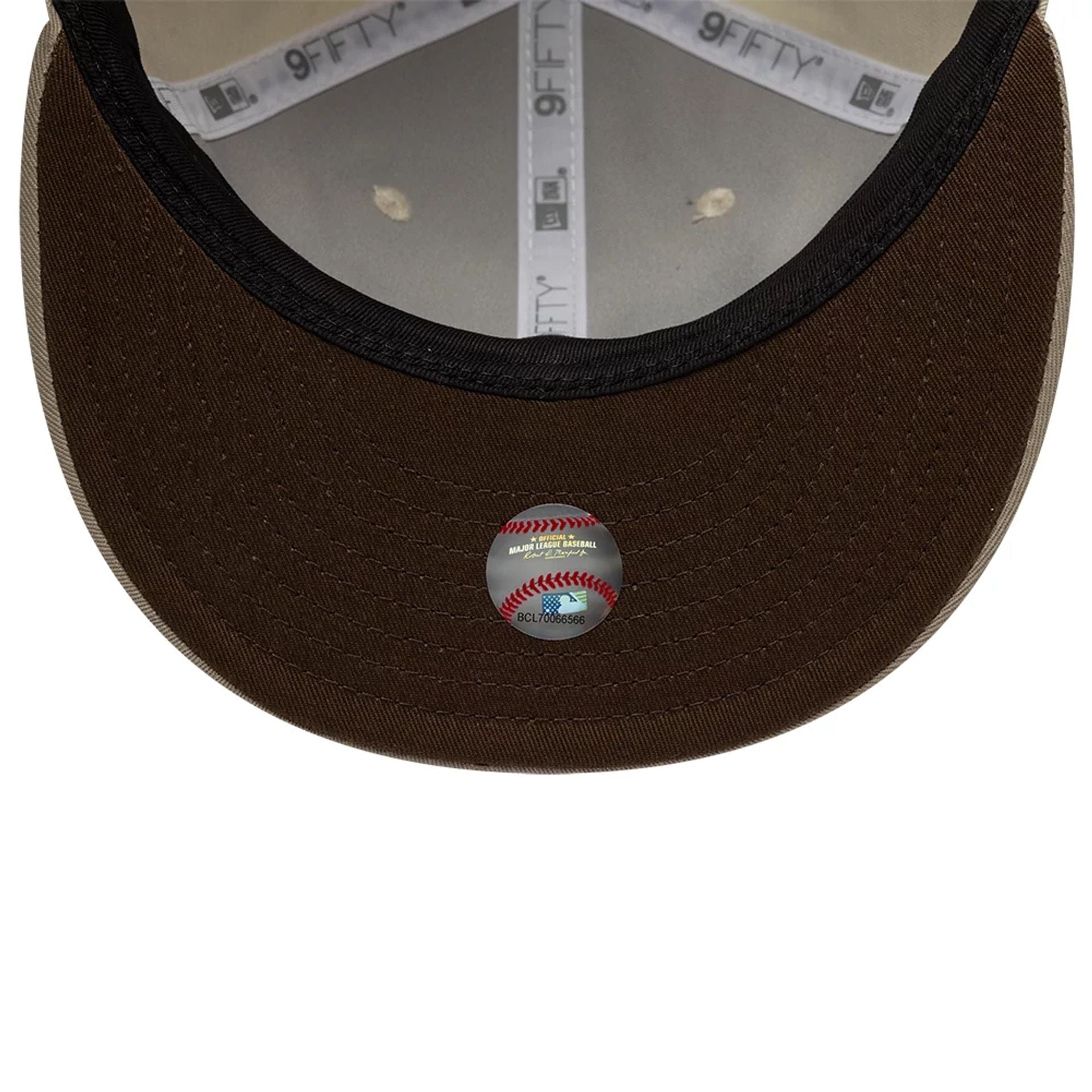 Pictured is this Hajime Sorayama X MLB San Diego Padres Retro Crown 9FIFTY cap in Cream. 2