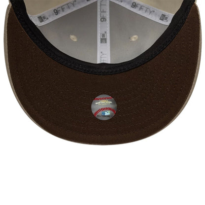 Pictured is this Hajime Sorayama X MLB San Diego Padres Retro Crown 9FIFTY cap in Cream. 2