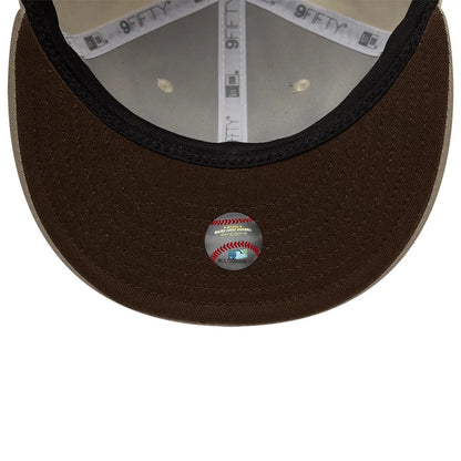 Pictured is this Hajime Sorayama X MLB San Diego Padres Retro Crown 9FIFTY cap in Cream. 2