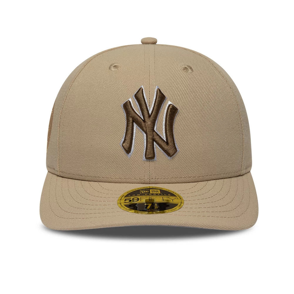 Pictured is this MLB College Varsity New York Yankees Low Profile 59FIFTY Fitted cap in beige. 3