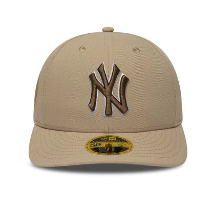 Pictured is this MLB College Varsity New York Yankees Low Profile 59FIFTY Fitted cap in beige. 3