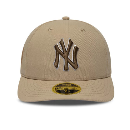 Pictured is this MLB College Varsity New York Yankees Low Profile 59FIFTY Fitted cap in beige. 3