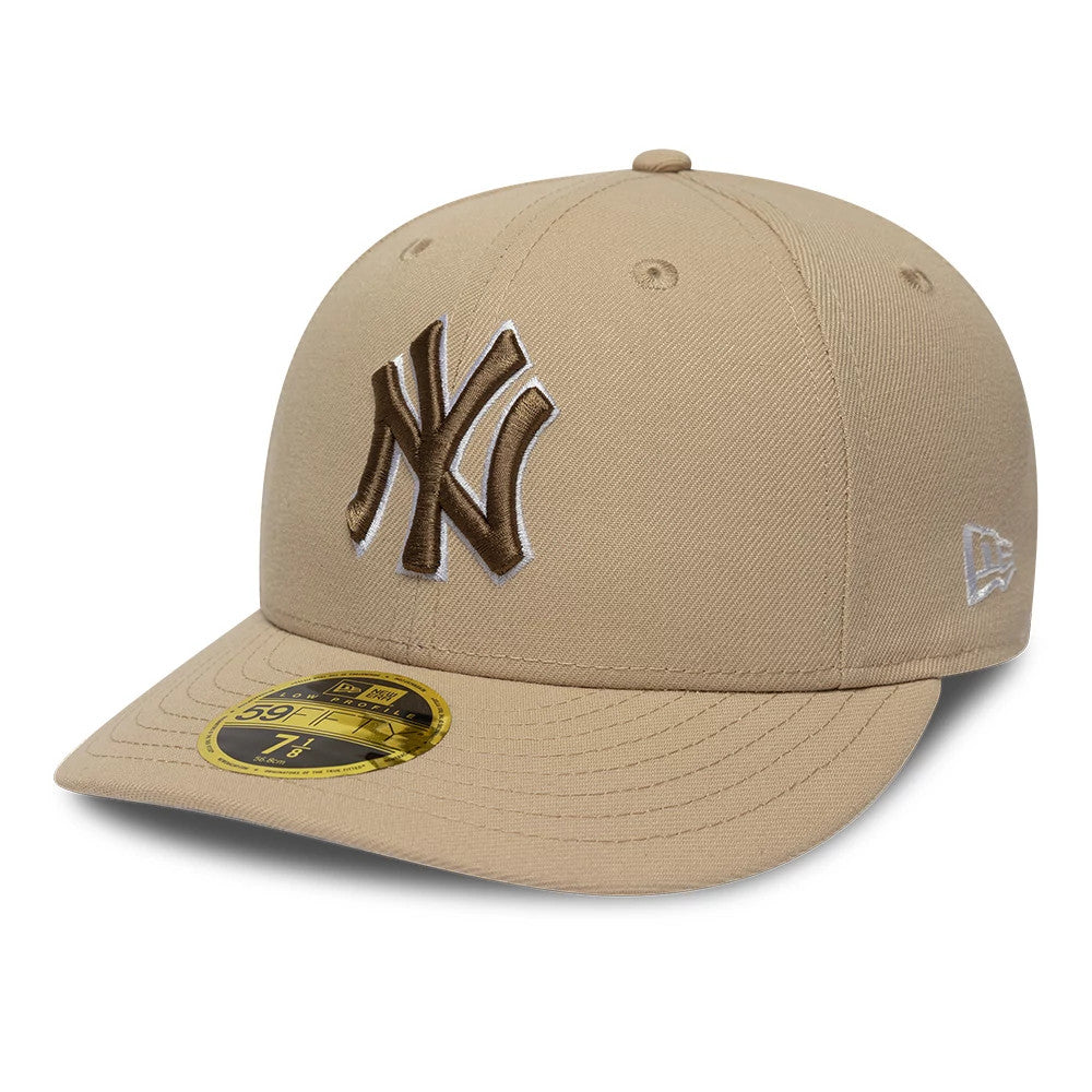 Pictured is this MLB College Varsity New York Yankees Low Profile 59FIFTY Fitted cap in beige. 4