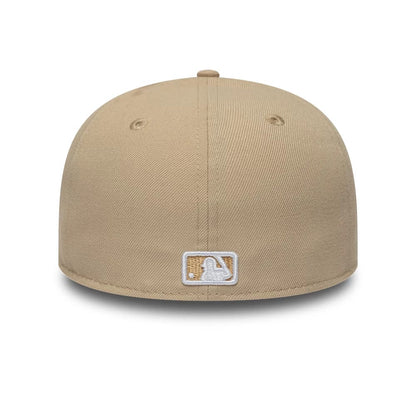 Pictured is this MLB College Varsity New York Yankees Low Profile 59FIFTY Fitted cap in beige. 7