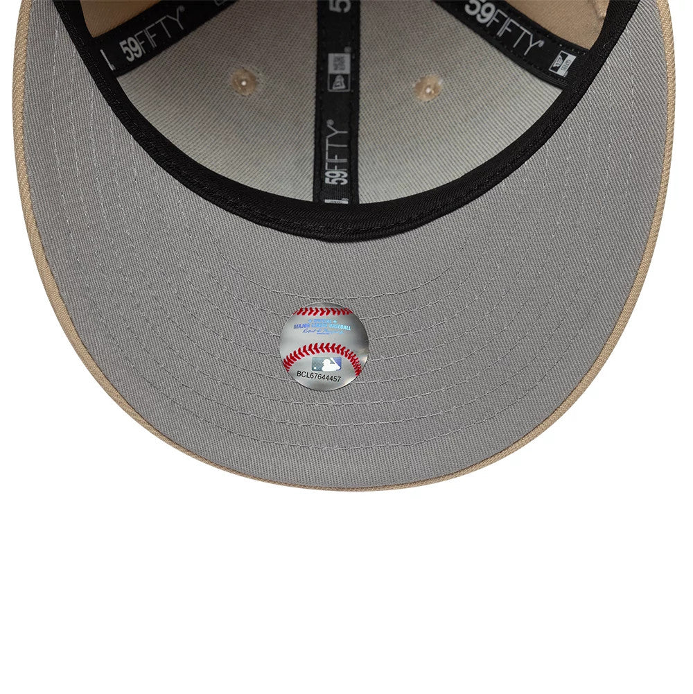 Pictured is this MLB College Varsity New York Yankees Low Profile 59FIFTY Fitted cap in beige. 2
